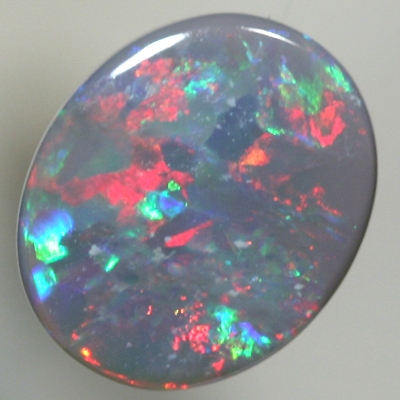 SOLID SEMI BLACK OPAL Red sparkles amongst green